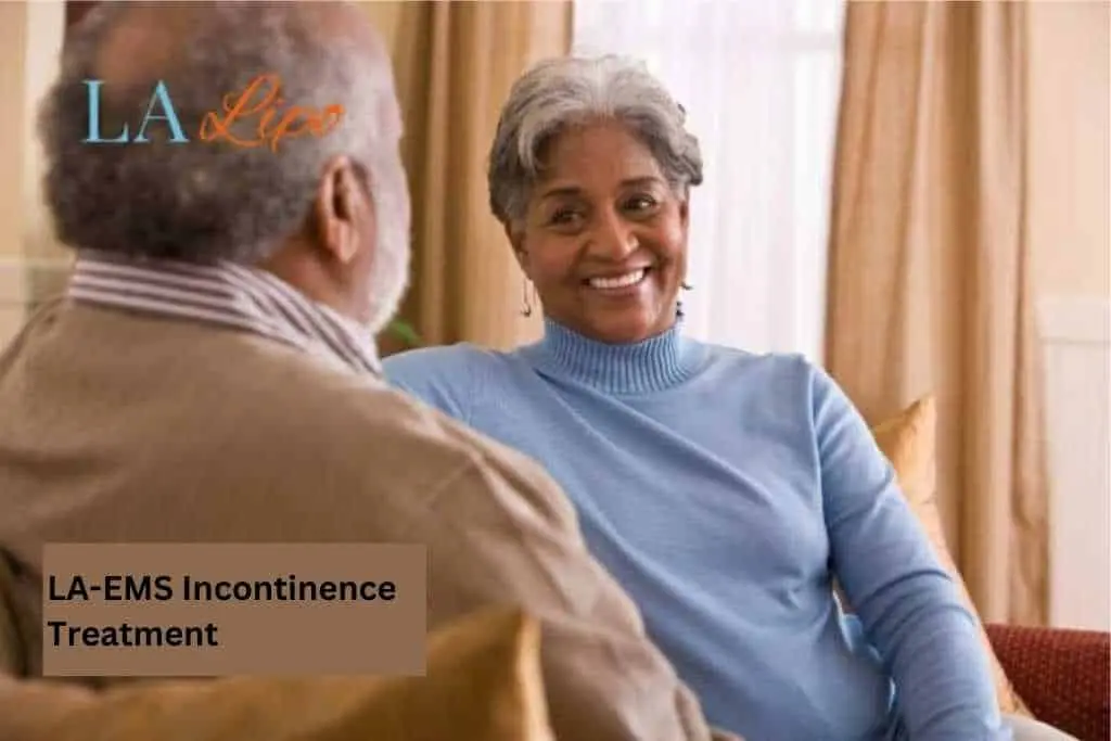 Couple sat smiling at each other - LA-EMS treatment Radlett